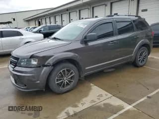 ✅ 2018 Dodge Journey SE • VIN: 3C4PDCABXJT274606 • Lot: 85117595. Listed on Copart with 122,502 mi. Free auction sales archive from the USA and detailed vehicle history report at DreamBid. Image 1.