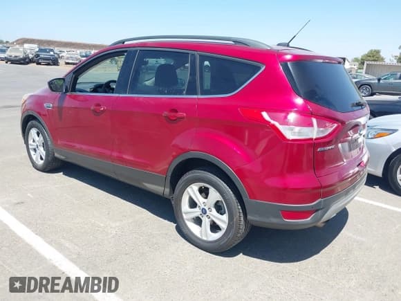 ✅ 2014 Ford Escape SE • VIN: 1FMCU9GX3EUB64623 • Lot: 42560923. Listed on IAAI with 120,730 mi. Free auction sales archive from the USA and detailed vehicle history report at DreamBid. Image 3.