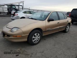 ✅ 1999 Pontiac Sunfire SE • VIN: 1G2JB5240X7567410 • Лот: 81315704. Опубликован ранее на Copart с пробегом 217 936 миль. Бесплатный доступ к архиву аукционных продаж из США и подробный отчёт об истории автомобиля на DreamBid. Изображение 1.