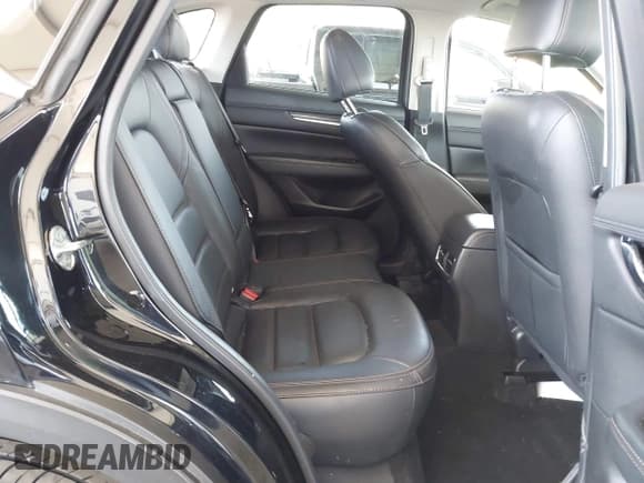 ✅ 2021 Mazda CX-5 Grand Touring • VIN: JM3KFADMXM1342413 • Lot: 41867153. Listed on IAAI with 38,519 mi. Free auction sales archive from the USA and detailed vehicle history report at DreamBid. Image 8.