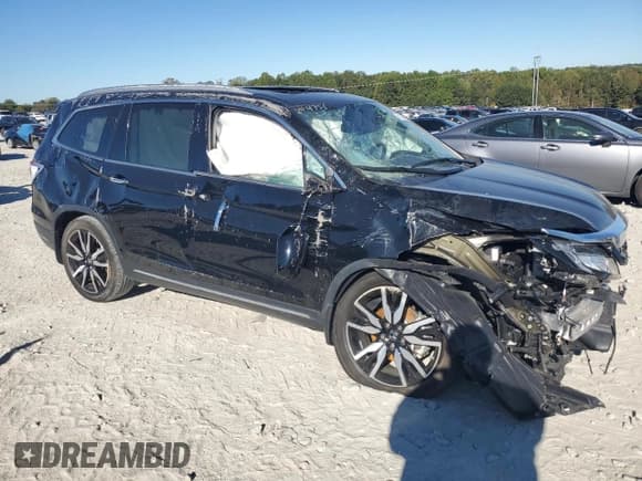 ✅ 2019 Honda Pilot Touring 8-Passenger • VIN: 5FNYF5H99KB013691 • Lot: 76752734. Listed on Copart with Not provided. Free auction sales archive from the USA and detailed vehicle history report at DreamBid. Image 4.