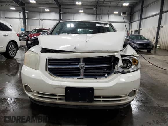 2010 Dodge Caliber Mainstreet с VIN 1B3CB3HA0AD542572, выставлен на аукционе Copart как лот 72781434 с пробегом 144 032 миль миль и Списание • Salvage title. История ставок и продаж доступна на DreamBid. Изображение 5.