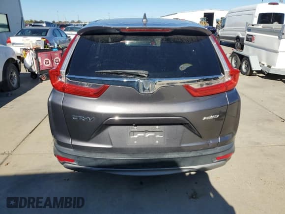 ✅ 2019 Honda CR-V EX • VIN: JHLRW2H5XKX009013 • Lot: 90274765. Wystawiony na Copart z przebiegiem 90 943 mil. Bezpłatny archiwum sprzedaży aukcyjnych z USA i szczegółowy raport historii pojazdu na DreamBid. Zdjęcie 6.