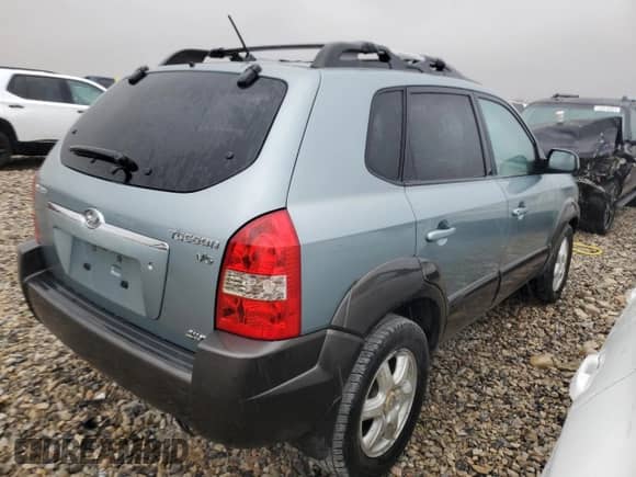 2005 Hyundai Tucson GLS z VIN KM8JN72DX5U214908, wystawiony jako Copart lot #76346024 z przebiegiem 152 677 mil mil oraz Szkoda całkowita • Salvage title. Historia ofert i sprzedaży dostępna na DreamBid. Obrazek 3.