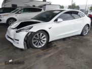 ✅ 2019 Tesla Model 3 Mid Range • VIN: 5YJ3E1EA9KF190553 • Лот: 43306660. Опубликован ранее на IAAI с пробегом 156 404 миль. Бесплатный доступ к архиву аукционных продаж из США и подробный отчёт об истории автомобиля на DreamBid. Изображение 2.