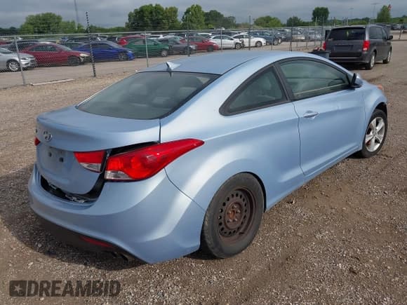 ✅ 2013 Hyundai Elantra GS • VIN: KMHDH6AE2DU000390 • Lot: 42613501. Listed on IAAI with 103,556 mi. Free auction sales archive from the USA and detailed vehicle history report at DreamBid. Image 4.
