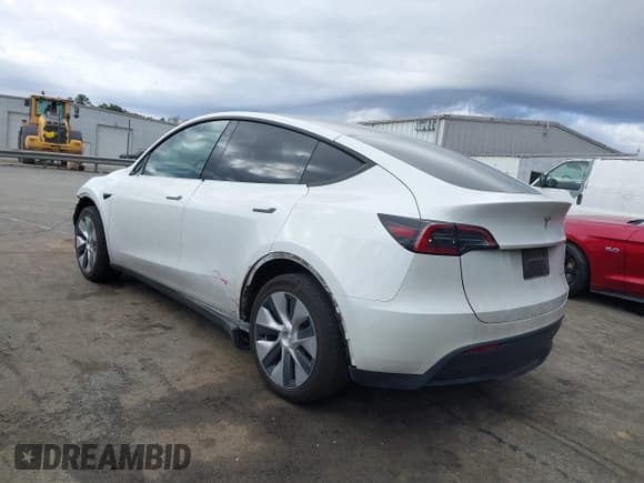 ✅ 2023 Tesla Model Y Long Range • VIN: 7SAYGDEE4PF621640 • Lot: 41796502. Listed on IAAI with 68,484 mi. Free auction sales archive from the USA and detailed vehicle history report at DreamBid. Image 3.