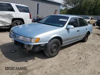 ✅ 1993 Ford Taurus • VIN: 1FACP52U9PA294854 • Лот: 51241535. Опубликован ранее на Copart с пробегом 81 948 миль. Бесплатный доступ к архиву аукционных продаж из США и подробный отчёт об истории автомобиля на DreamBid. Изображение 1.