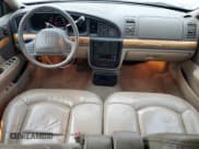 ✅ 2001 Lincoln Continental • VIN: 1LNHM97V41Y633841 • Лот: 86695664. Опубликован ранее на Copart с пробегом 166 931 миль. Бесплатный доступ к архиву аукционных продаж из США и подробный отчёт об истории автомобиля на DreamBid. Изображение 8.