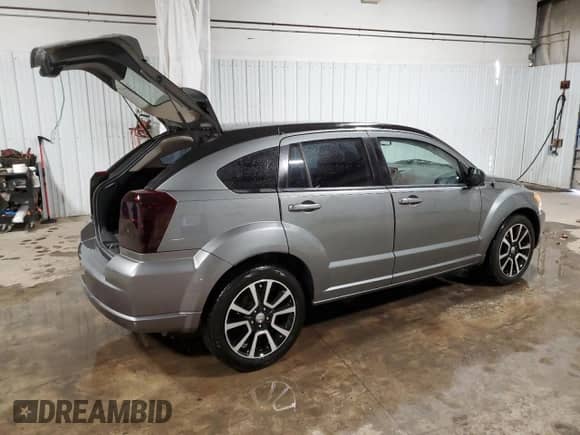 2012 Dodge Caliber SXT Plus with VIN 1C3CDWEA0CD506581, listed as a Copart auction lot 48167375 with 123,880 mi miles and Salvage title. Bid and sale history available at DreamBid. Image 3.