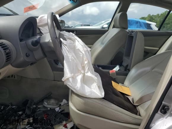 ✅ 2004 Infiniti G35 w/Leather • VIN: JNKCV51E94M103744 • Lot: 65177085. Listed on Copart with 178,543 mi. Free auction sales archive from the USA and detailed vehicle history report at DreamBid. Image 7.