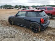 ✅ 2023 MINI Hardtop John Cooper Works • VIN: WMW73DH01P2T85209 • Lot: 56054275. Listed on Copart with 15,545 mi. Free auction sales archive from the USA and detailed vehicle history report at DreamBid. Image 2.