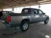 2006 Dodge Dakota SLT с VIN 1D7HE48K56S641262, выставлен на аукционе Copart как лот 71261245 с пробегом 133 008 миль миль и Чистый • Clean title. История ставок и продаж доступна на DreamBid. Изображение 3.