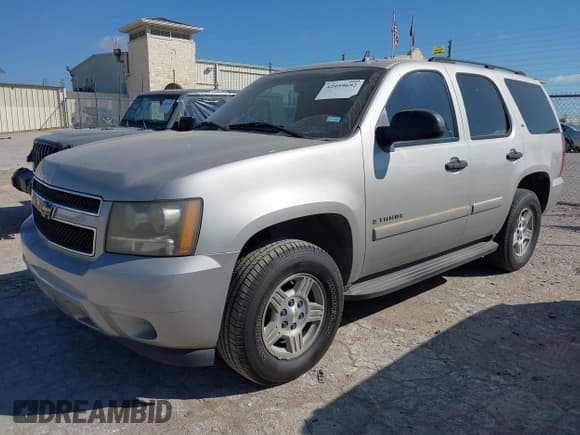 ✅ 2007 Chevrolet Tahoe LS • VIN: 1GNFC13C87R257711 • Lot: 42959692. Listed on IAAI with 308,717 mi. Free auction sales archive from the USA and detailed vehicle history report at DreamBid. Image 2.