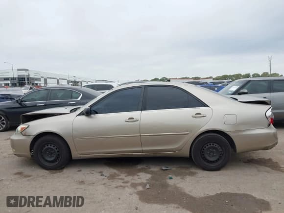 ✅ 2004 Toyota Camry LE • VIN: JTDBE32K640274741 • Лот: 43517408. Опубликован ранее на IAAI с пробегом 264 900 миль. Бесплатный доступ к архиву аукционных продаж из США и подробный отчёт об истории автомобиля на DreamBid. Изображение 14.