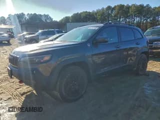 ✅ 2019 Jeep Cherokee Trailhawk Elite • VIN: 1C4PJMBX1KD458865 • Лот: 95158745. Опубликован ранее на Copart с пробегом 97 390 миль. Бесплатный доступ к архиву аукционных продаж из США и подробный отчёт об истории автомобиля на DreamBid. Изображение 1.