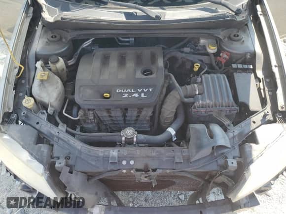 2013 Dodge Avenger SE z VIN 1C3CDZAB7DN752331, wystawiony jako Copart lot #63833124 z przebiegiem 156 112 mil mil oraz Szkoda całkowita • Salvage title. Historia ofert i sprzedaży dostępna na DreamBid. Obrazek 11.