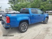 ✅ 2022 Chevrolet Colorado 4WD Z71 • VIN: 1GCGTDEN9N1149851 • Лот: 66387524. Опубликован ранее на Copart с пробегом 28 137 миль. Бесплатный доступ к архиву аукционных продаж из США и подробный отчёт об истории автомобиля на DreamBid. Изображение 3.