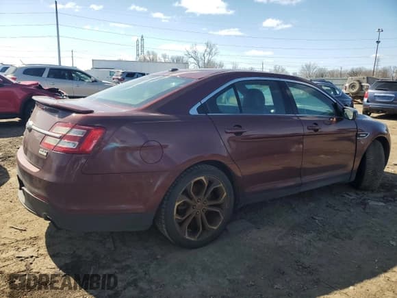 ✅ 2016 Ford Taurus SHO • VIN: 1FAHP2KT6GG140921 • Lot: 52118935. Listed on Copart with 132,199 mi. Free auction sales archive from the USA and detailed vehicle history report at DreamBid. Image 3.