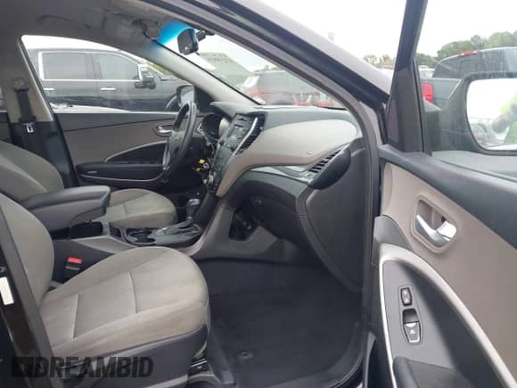 2016 Hyundai Santa Fe z VIN 5XYZUDLB4GG372753, wystawiony jako IAAI lot #43239818 z przebiegiem 134 901 mil mil oraz . Historia ofert i sprzedaży dostępna na DreamBid. Obrazek 5.