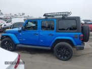 ✅ 2023 Jeep Wrangler Sahara • VIN: 1C4JJXP63PW579805 • Lot: 43401399. Listed on IAAI with 41,989 mi. Free auction sales archive from the USA and detailed vehicle history report at DreamBid. Image 13.