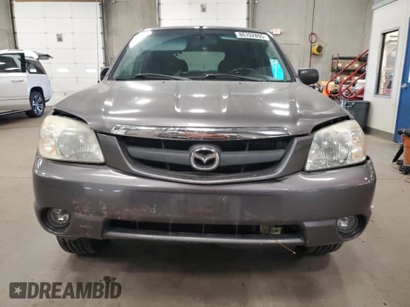 ✅ 2003 Mazda Tribute LX • VIN: 4F2YZ04173KM05549 • Lot: 86702895. Listed on Copart with 128,757 mi. Free auction sales archive from the USA and detailed vehicle history report at DreamBid. Image 5.