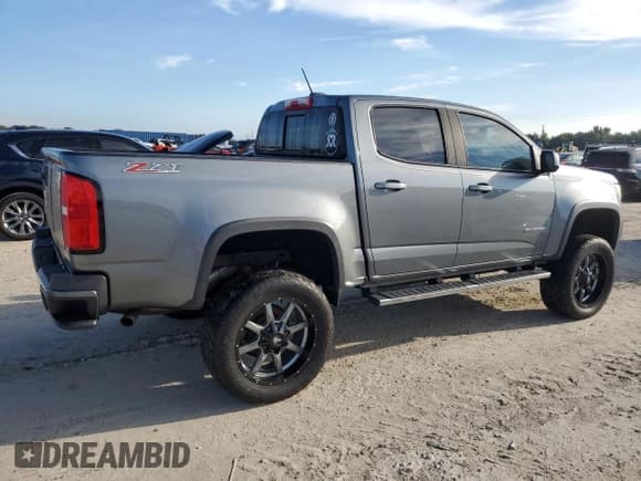 ✅ 2018 Chevrolet Colorado 4WD Z71 • VIN: 1GCGTDEN6J1288071 • Лот: 73642694. Опубликован ранее на Copart с пробегом Не указан. Бесплатный доступ к архиву аукционных продаж из США и подробный отчёт об истории автомобиля на DreamBid. Изображение 3.