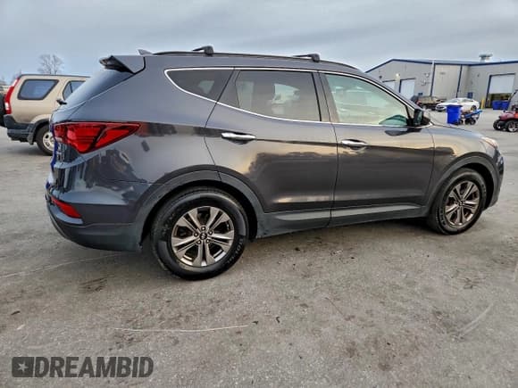✅ 2017 Hyundai Santa Fe 2.4L • VIN: 5XYZU3LB4HG385157 • Lot: 95257105. Listed on Copart with 175,392 mi. Free auction sales archive from the USA and detailed vehicle history report at DreamBid. Image 3.