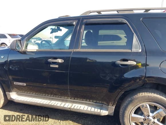 ✅ 2008 Ford Escape XLT • VIN: 1FMCU93178KB26331 • Lot: 43666710. Listed on IAAI with 101,425 mi. Free auction sales archive from the USA and detailed vehicle history report at DreamBid. Image 14.