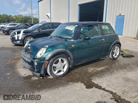 ✅ 2006 MINI Hardtop • VIN: WMWRC33516TK73878 • Lot: 92715115. Listed on Copart with 272,663 mi. Free auction sales archive from the USA and detailed vehicle history report at DreamBid. Image 1.