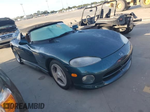 ✅ 1995 Dodge Viper • VIN: 1B3BR65E9SV201019 • Lot: 77252124. Listed on Copart with Not provided. Free auction sales archive from the USA and detailed vehicle history report at DreamBid. Image 4.