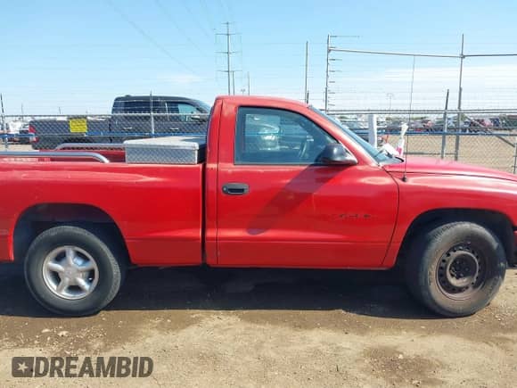 2000 Dodge Dakota z VIN 1B7FL26PXYS774614, wystawiony jako IAAI lot #41421195 z przebiegiem 188 823 mil mil oraz . Historia ofert i sprzedaży dostępna na DreamBid. Obrazek 13.