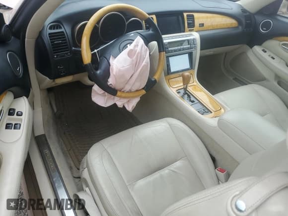 ✅ 2005 Lexus SC 430 • VIN: JTHFN48Y250070683 • Lot: 81448965. Wystawiony na Copart z przebiegiem 63 271 mil. Bezpłatny archiwum sprzedaży aukcyjnych z USA i szczegółowy raport historii pojazdu na DreamBid. Zdjęcie 8.