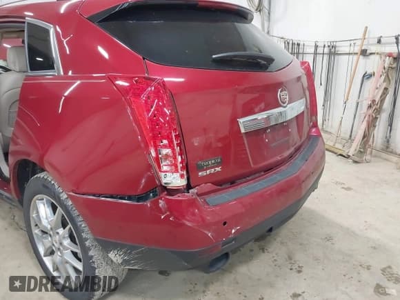 ✅ 2014 Cadillac SRX Performance Collection • VIN: 3GYFNCE30ES596415 • Lot: 42329771. Listed on IAAI with 71,620 mi. Free auction sales archive from the USA and detailed vehicle history report at DreamBid. Image 6.