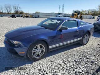✅ 2012 Ford Mustang V6 • VIN: 1ZVBP8AM9C5272104 • Lot: 90123735. Listed on Copart with 114,829 mi. Free auction sales archive from the USA and detailed vehicle history report at DreamBid. Image 1.