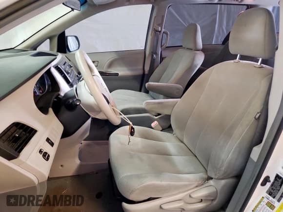 ✅ 2014 Toyota Sienna L • VIN: 5TDZK3DC5ES459424 • Lot: 92722285. Listed on Copart with 110,989 mi. Free auction sales archive from the USA and detailed vehicle history report at DreamBid. Image 7.