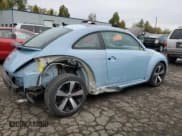 ✅ 2014 Volkswagen Beetle Turbo R-Line • VIN: 3VWVT7AT7EM663694 • Lot: 76801204. Listed on Copart with 55,597 mi. Free auction sales archive from the USA and detailed vehicle history report at DreamBid. Image 3.