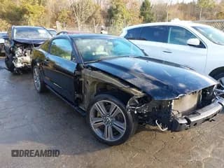 ✅ 2014 Ford Mustang V6 • VIN: 1ZVBP8AMXE5209242 • Lot: 43666689. Listed on IAAI with 111,071 mi. Free auction sales archive from the USA and detailed vehicle history report at DreamBid. Image 1.