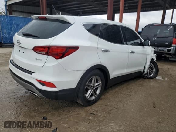 ✅ 2018 Hyundai Santa Fe 2.4L • VIN: 5NMZT3LB4JH093197 • Лот: 38622154. Опубликован ранее на Copart с пробегом 93 540 миль. Бесплатный доступ к архиву аукционных продаж из США и подробный отчёт об истории автомобиля на DreamBid. Изображение 3.