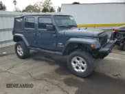 ✅ 2007 Jeep Wrangler Unlimited Sahara • VIN: 1J4GB59107L184277 • Lot: 84781475. Listed on Copart with 264,496 mi. Free auction sales archive from the USA and detailed vehicle history report at DreamBid. Image 4.