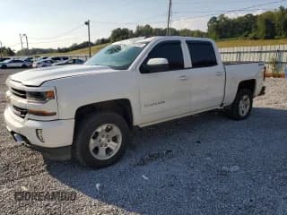 ✅ 2018 Chevrolet Silverado 1500 LT • VIN: 3GCUKREC4JG615182 • Lot: 81304305. Listed on Copart with 192,408 mi. Free auction sales archive from the USA and detailed vehicle history report at DreamBid. Image 1.