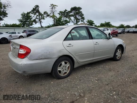 ✅ 2003 Toyota Camry LE • VIN: 4T1BF32K73U546228 • Лот: 64672915. Опубликован ранее на Copart с пробегом 161 872 миль. Бесплатный доступ к архиву аукционных продаж из США и подробный отчёт об истории автомобиля на DreamBid. Изображение 3.