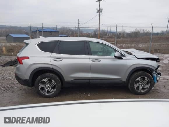 2022 Hyundai Santa Fe SE z VIN 5NMS1DAJ1NH400726, wystawiony jako IAAI lot #41680232 z przebiegiem 21 188 mil mil oraz . Historia ofert i sprzedaży dostępna na DreamBid. Obrazek 14.