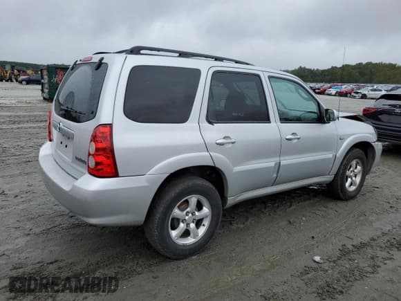 ✅ 2006 Mazda Tribute i • VIN: 4F2YZ02Z26KM14821 • Lot: 71718434. Wystawiony na Copart z przebiegiem 318 841 mil. Bezpłatny archiwum sprzedaży aukcyjnych z USA i szczegółowy raport historii pojazdu na DreamBid. Zdjęcie 3.