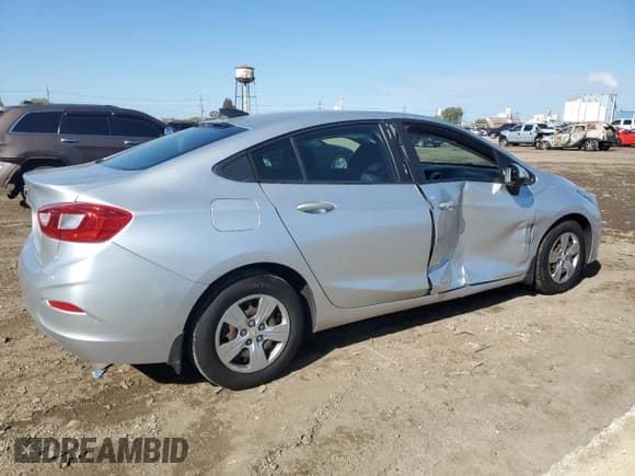 ✅ 2016 Chevrolet Cruze LS • VIN: 1G1BC5SM2G7275103 • Lot: 87014805. Listed on Copart with 142,893 mi. Free auction sales archive from the USA and detailed vehicle history report at DreamBid. Image 3.