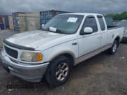 ✅ 1997 Ford F-150 XL • VIN: 1FTEX17L1VNB15658 • Lot: 42353422. Wystawiony na IAAI z przebiegiem 217 975 mil. Bezpłatny archiwum sprzedaży aukcyjnych z USA i szczegółowy raport historii pojazdu na DreamBid. Zdjęcie 6.