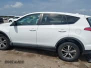 ✅ 2018 Toyota RAV4 XLE • VIN: 2T3WFREV7JW408560 • Lot: 42296818. Listed on IAAI with 130,493 mi. Free auction sales archive from the USA and detailed vehicle history report at DreamBid. Image 14.