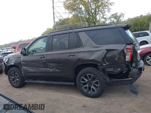 ✅ 2021 Chevrolet Tahoe Z71 • VIN: 1GNSKPKD9MR256237 • Lot: 43509946. Listed on IAAI with 61,919 mi. Free auction sales archive from the USA and detailed vehicle history report at DreamBid. Image 14.