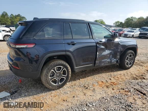 2022 Jeep Grand Cherokee Trailhawk with VIN 1C4RJYC69N8760360, listed as a Copart auction lot 51341625 with 28,614 mi miles and Salvage title. Bid and sale history available at DreamBid. Image 3.