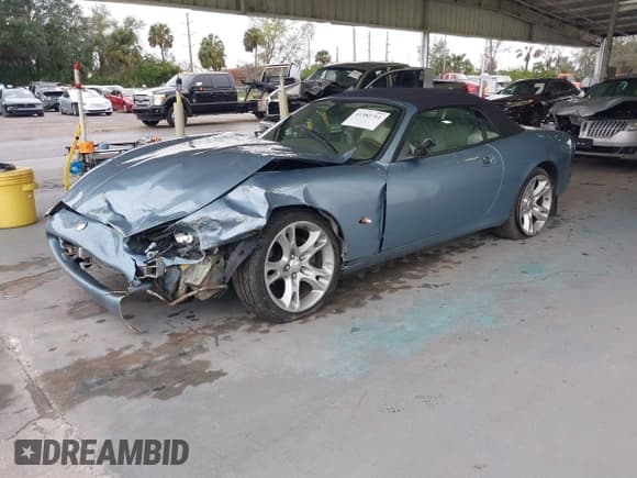 ✅ 2004 Jaguar XK • VIN: SAJDA42C442A37063 • Lot: 41382711. Listed on IAAI with 90,010 mi. Free auction sales archive from the USA and detailed vehicle history report at DreamBid. Image 18.